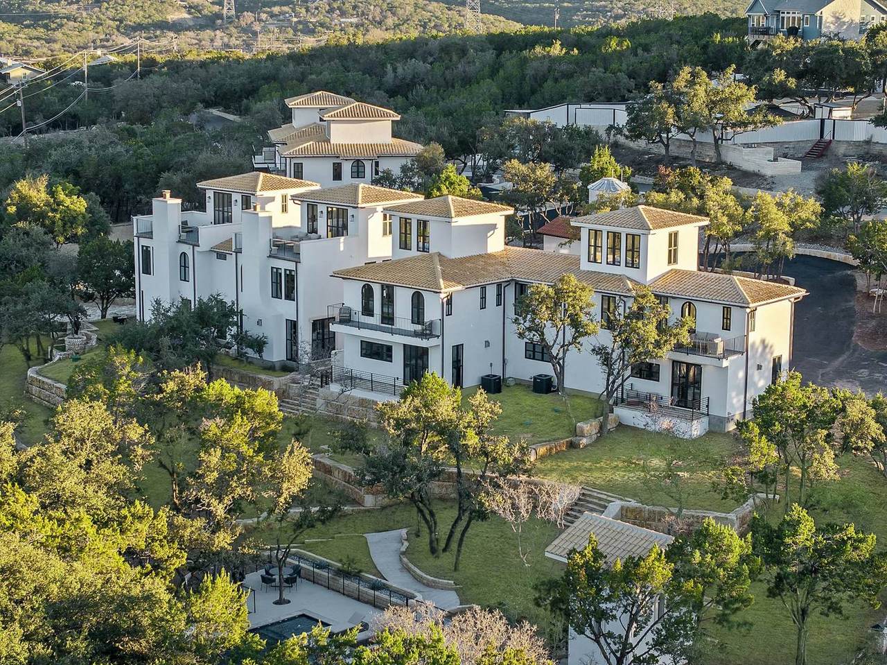 Cluster of villas with terracotta roofs at Las Luces Village