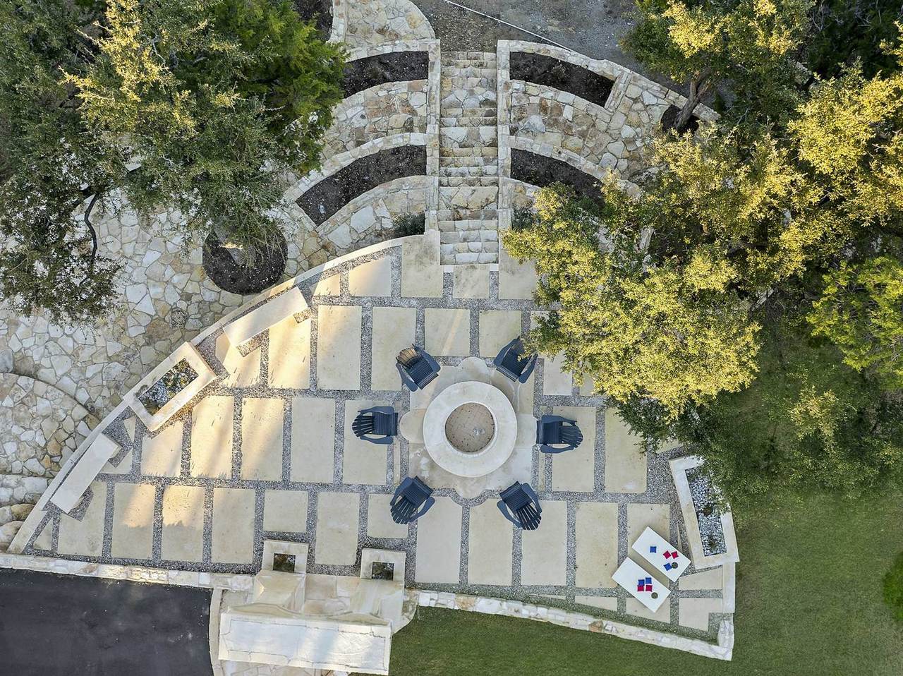 Aerial view of the stone fire pit courtyard at Las Luces Village