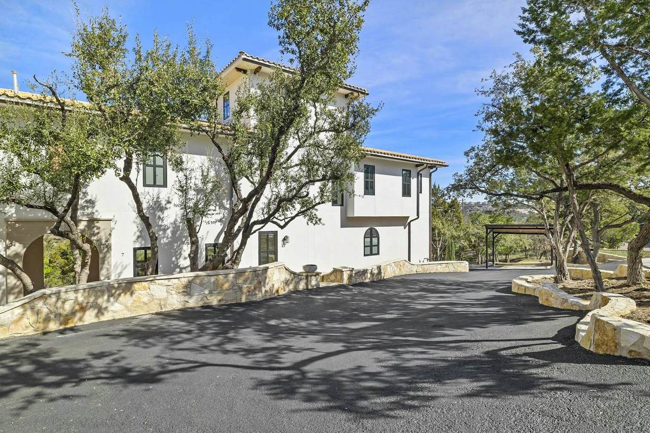 White stucco villa facade at Las Luces Village
