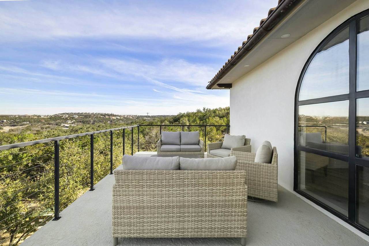 Villa 7 at Las Luces Village: the balcony with panoramic views across the valley