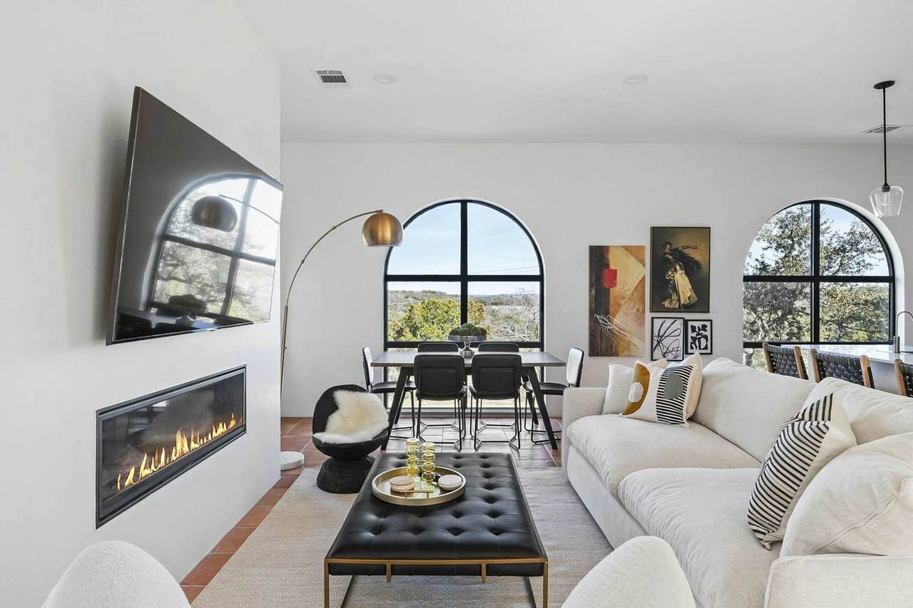 Villa 7 at Las Luces Village: the living room with sofa seating and a gas fireplace